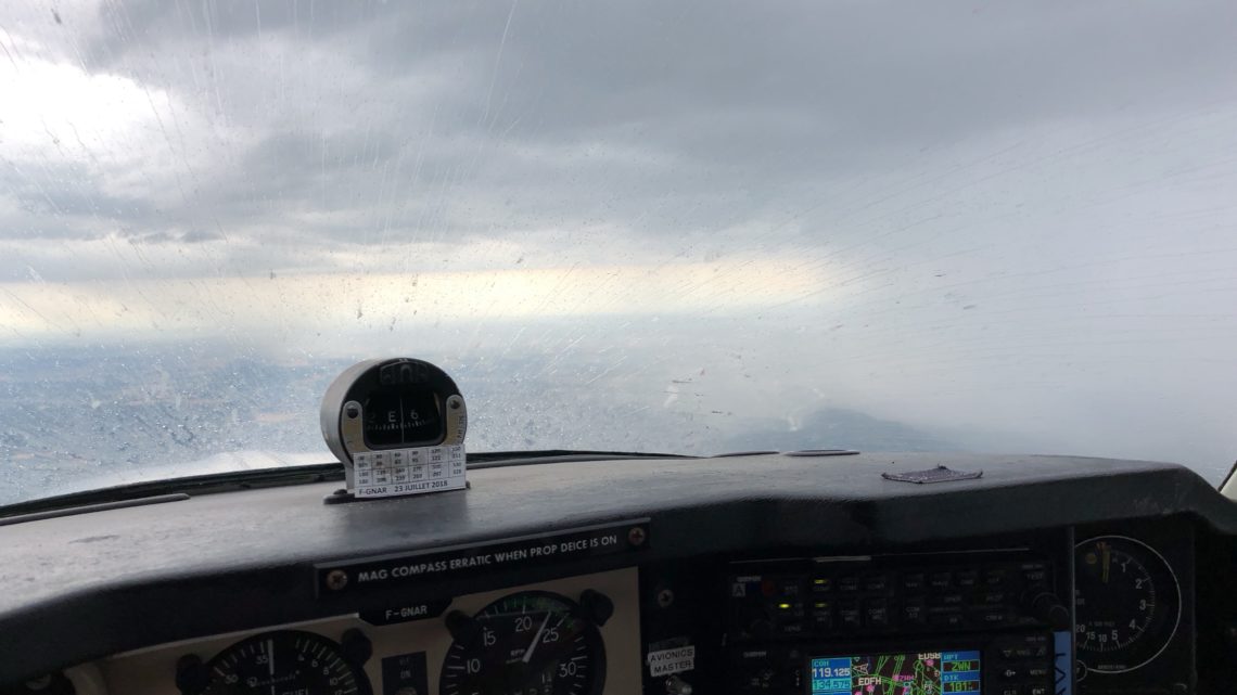 Lorraine control , request twenty degrees left due to wheather condition , and request descent to flight level seven zero